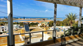 P6 duplex vue sûr mer avec trois piscines